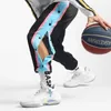 Pantalons pour hommes Harajuku Mode Sports Hommes Quotidien En Plein Air Basketball Pantalons De Survêtement Évider Side Stripe Bouton Fly Design Pantalon Créatif 230428