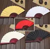 Parti lehine 50pcs katlanır fan siyah beyaz kumaş ahşap el diy zanaat sanat ekim süsleri erkekler açık hava büyük 33cm toptan