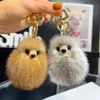 Lindo llavero de piel de visón auténtica Bola de piel pompón bolso encanto monedero coche colgante para teléfono juguetes para niños