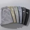 Pantalones cortos para hombres 4 colores Estilo clásico Pantalones cortos delgados para hombres 2023 Verano Nueva moda de negocios Pantalones cortos elásticos delgados Pantalones casuales masculinos Beige Caqui Gris P230505