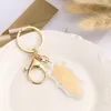 Porte-clés Feuille D'or Papier Rune Pendentif Bon Ordre Chanceux Porte-clés Pour Téléphone Charme Porte-clés Sac À Dos Sac Suspendu Décor Creative Souvenir