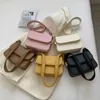 Nxy Mini Leather Cute Mitue Cold Color Bags New Simple Designer Dimbag Lady Phouse Phound Undermy Bag 230424