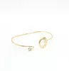 Bracelet mode simple verre clair cristal cuivre disque rond charme U pour les femmes