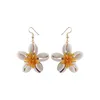 Boucles d'oreilles de fleurs de coquille de conque de bohême de vent d'océan pour des femmes