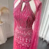 Бальные платья Шарон Саид Роскошные Дубайские розовые вечерние русалки с рукавами-накидкой 2023 Арабские женские свадебные платья для гостей SS361 230505