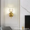 Lampada da parete in rame nordico semplice soggiorno TV sfondo camera da letto comodino scala luce moderna lusso testa singola cristallo