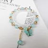 Urok bransolety est koreańskie kolorowe z koraliki bransoletka motyla akrylowa dla kobiet damskie pasmo biżuterii moda