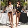 Kvinnors badkläder 2023 Boho White Crochet Sticke Beach Cover Up Dress Tunic Long Pareos Bikinis S Swim Robe Plage Beachwear 230504