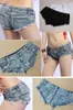 Jeans pour femmes # 1076 Sexy taille basse Shorts femmes plage Style coton mince court Denim femme été maigre dames filles gland