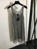 Dames sexy pure jurk zwart satijnen sling strass strass glanzende holte vestjurken 2pcs set badge kristal tank tops dame sling tops