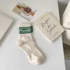 Chaussettes Chaussettes Homme Printemps/Été Nouvelle Lettre Numb Chaussettes Tube Moyen Noir et Blanc Chaussettes de Sport de Rue Chaussettes Homme Portant des Chaussettes Tendance à l'Extérieur