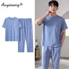 Mäns sömnkläder Summer Cotton Men Pyjama sätter kort ärm långa byxor avslappnad loungewear för pojke lyxiga sömnkläder V-ringar eleganta herrkläder 230505