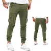 Calça masculina calça de carga masculina estilo militar outono primavera tática de calça de calça fora de moda plus size muitas calças de bolso longo zíper masculino Fly 3xl 230504