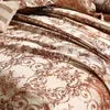 Sängkläder sätter Europa och Amerika Jacquard Luxury Bedding Set Satin Moderna lyxiga sängkläder set avancerad rayon bröllopsdäcke täckning set drottning 230504