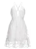 Casual klänningar sexiga spetsar miniklänningar kvinnor sommaren av axel rygglös spaghetti rem klänning elegant vit blommig broderad strand sundress z0506