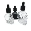 30 ml 60 ml schedelfles bittere fles e vloeistof met zwarte schedelvorm glas druppelaar fles met kindbewijs