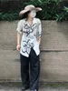女性のブラウスシャツ2023ペインティングペインティングフラワーデイジーグラフィックシャツ男性女性韓国トレンド特大のボタンアップ夏の半袖カジュアルブラウスP230506