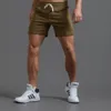Мужские шорты белые дорожки Шорты Мужчины, тренирующие эластичные талию по всему поту шорты бегут мужчины летние тренировки фитнес -шорты с карманом 230506
