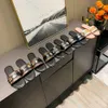 2023 Designer slippers vergrendelen het platte bodem sandaal vrouwen platte sandalen glijbanen monogrammen plaid open-teen set voet vakantie strand vlakke slippers casual schoenen glijbaan