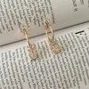Hoepel oorbellen Mooie gouden kleur plating heldere steen versierd s initiële charme voor vrouwen meisje mooie schattige casual sieraden