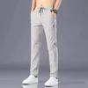 Calça 2022 Calças casuais de masculino Hot Men Chinos Algodão elástico Seluar Longa calça preta cáqui para homens