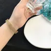 Bangle ihåliga pärlor armband form design guld färg rostfritt stål för kvinnliga gåvor grossist