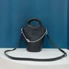 Designer Cowhide Bag Bucket Bag Women One Shoulder Crossbody Bag Designer Bag Handväska Tiffanyies Litchi Grain Chain Decoration Tote Luxury Shopping Bag Läderväska