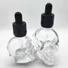 30 ml 60 ml Crâne Bouteille Amer Bouteille E Liquide Givré Noir Crâne Forme Flacon compte-gouttes En Verre Avec L'épreuve Des Enfants