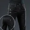 Мужские джинсовые джинсы модные мужская одежда тонкая пуговица Black Jeans Solid Color Street Skateboard Multi-Boutton Youth Shinny Denim Bants 230506