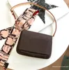 Designer damestas handtas portemonnee messenger schouder cross body datumcode serienummer bloemenketting