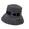 Nouveau élégant lettre seau pêcheur chapeau de paille femme printemps et été voyage parasol style japonais et Internet-célèbre chapeau de protection solaire noir et blanc