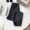 Spodnie damskie w stylu Mesh jesienne i sportowe luźne legginsy Slim Casual Harlan