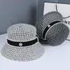 Chapeau de seau de seau de paille de paille creux de paille en été femme chapeau de seau de seau de style coréen de style coréen