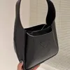 Nouveau sac à main pour femme sac design sac fourre-tout de luxe en cuir sac à main triangle classique grande capacité voyage un sac à bandoulière en cuir souple mode sac en forme de seau décontracté