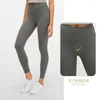 Actieve broek 2023 lente/zomer naakt yoga voor vrouwen geen onhandige lijn hoge taille heup lift rekbare fitnessoefening 9/10 broek