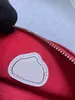 Crossbody axelväska med lyxig polka dot design sadel väska tofs zipper fickan pengar handväska designer kedja slingväska