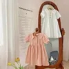 Flickaklänningar 2023 Summer Korean Children's Dress French Jacquard Sweet Beauty Doll Neck Kort ärm