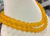 Chaînes élégantes 10MM NATUREL Circulaire Jaune JADE COLLIER 36''