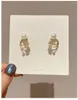 Kolczyki stadnorskie Davini Leaf Studs imitacja Pearls Ginkgo for Women Fashion Biżuter