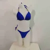 Designer Fashion 2023 Nuovi costumi da bagno Accessori in metallo Bikini con lacci Costumi da bagno sexy con spacco sul retro aperto per magliette da donna