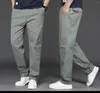 Мужские костюмы 2023 повседневные хлопковые мужские брюки Solid Slim Fit Spring осень высококачественных классических бизнес -брюк T215