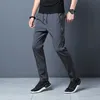 Pantaloni da uomo estivi casual in seta di ghiaccio sottili sportivi pantaloni dritti elastici traspiranti ad asciugatura rapida 230506