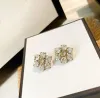 مصمم الأزياء Crystal Rhinestone Earrings Ear Stud Aretes لديها طوابع أعلى المواد النحاسية للمرأة مجوهرات حفل الزفاف