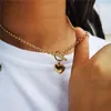 Set di orecchini per collana Set di braccialetti a ginocchiera in acciaio inossidabile stile MinaMaMa con catena rotonda a forma di cuore per donna