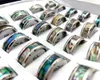 1600 pièces mélangent des anneaux en acier inoxydable spin shell bague de bijoux de bande plaine