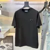 2023 MENS مصممين T Shirt Man Tshirt مع رسائل طباعة الأكمام القصيرة القمصان الصيفية الرجال فضفاضة المحملات الآسيوية الحجم S-5XL