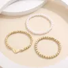 STRAND BOHEMIAN 3PCS/Set Pearl kralen Bracelet Hanmade Woved Gold Color Heart Hand String voor vrouwen Girls 2023 Trend Boho sieraden