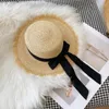 Chapéus largos da aba Coréia Raffia natural birm chapéu de sol diariamente casual palha preta arco branco teceamento de UV bloqueio de férias na praia panamá