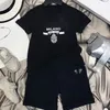 Child XY Designer Clothde Set 2022SS Childrens barn Kort ärm T-shirt + tryck Shorts Set Suit Märke X Yayoi Kusama pojkar Kläder Bomull Tees Size Black White AAA