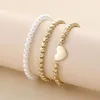 STRAND BOHEMIAN 3PCS/Set Pearl kralen Bracelet Hanmade Woved Gold Color Heart Hand String voor vrouwen Girls 2023 Trend Boho sieraden